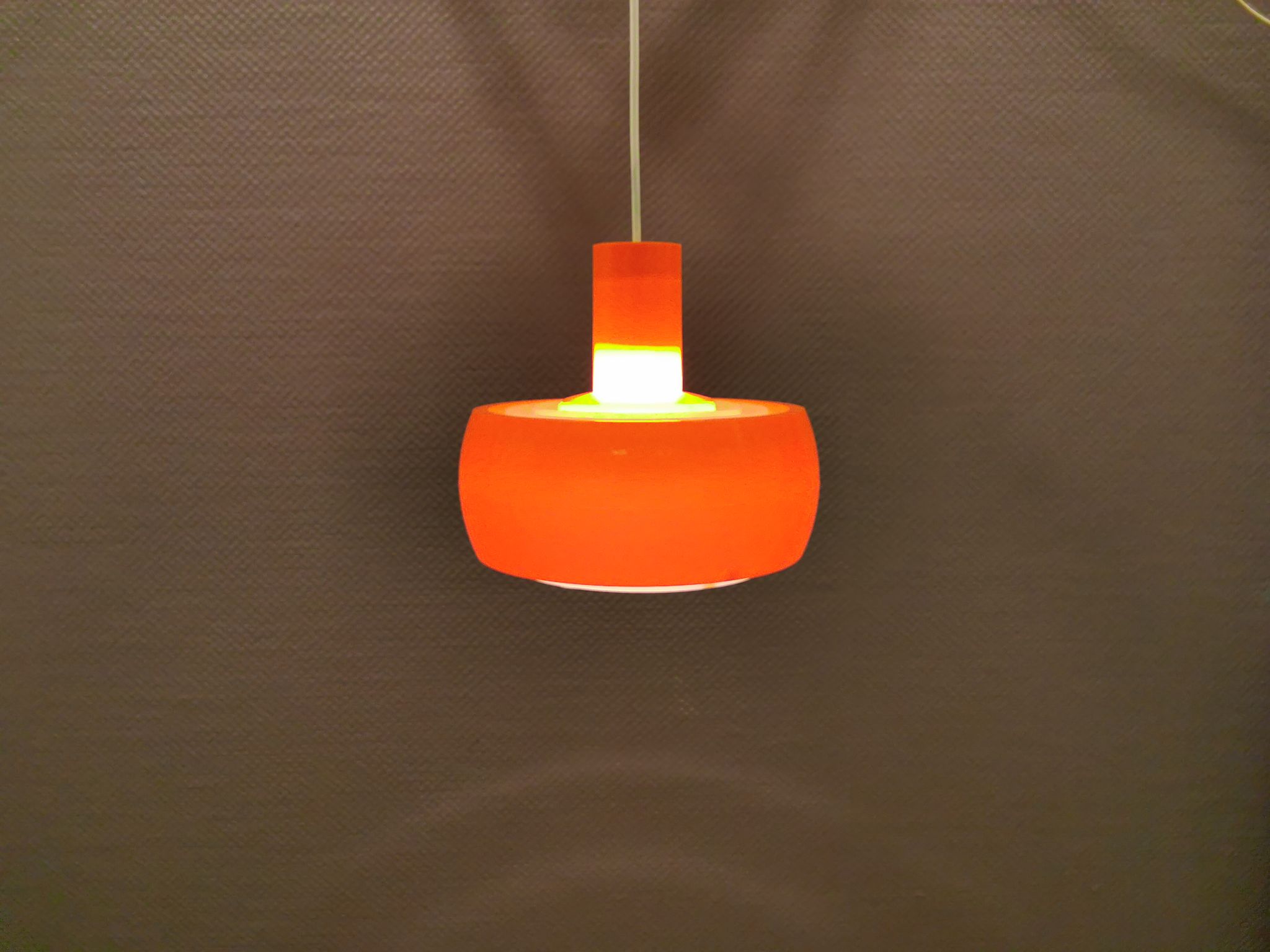 Hanging lamp, designed by Bent Karlby for Schrøder Kemi Denmark 1970s. Made of orange ABS plastic