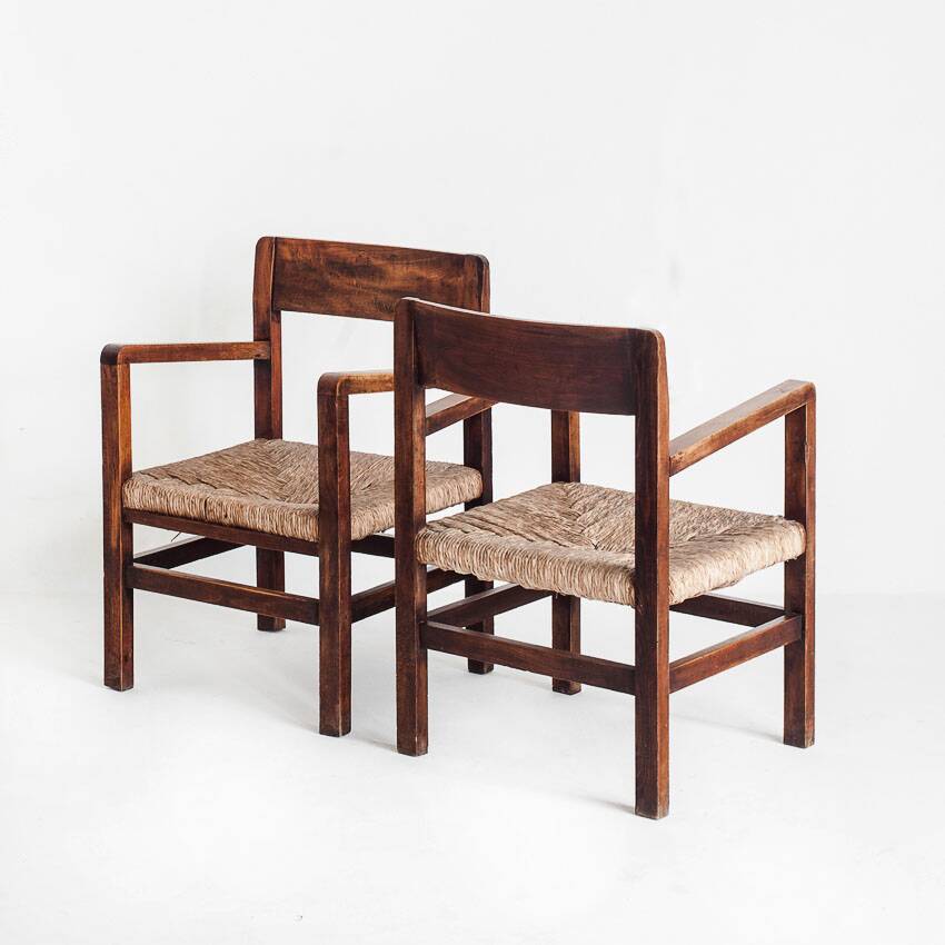 Pair of rustic armchairs in solid wood and straw seats. France, 1940s