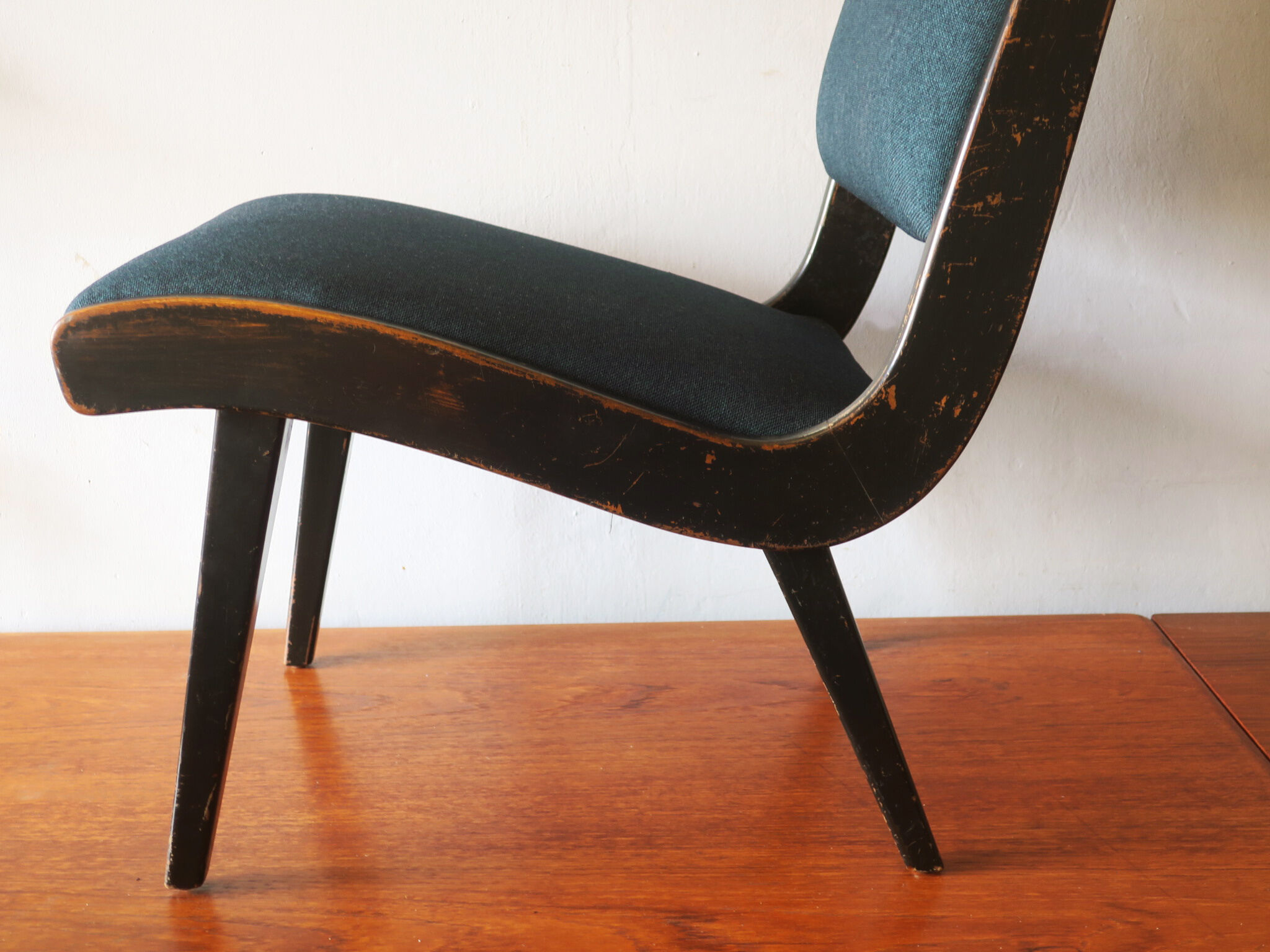 Jens Risom armless chair with ebonized frame and petrol blue-green covers