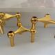 Series of 3 gold Nagel modular candlesticks