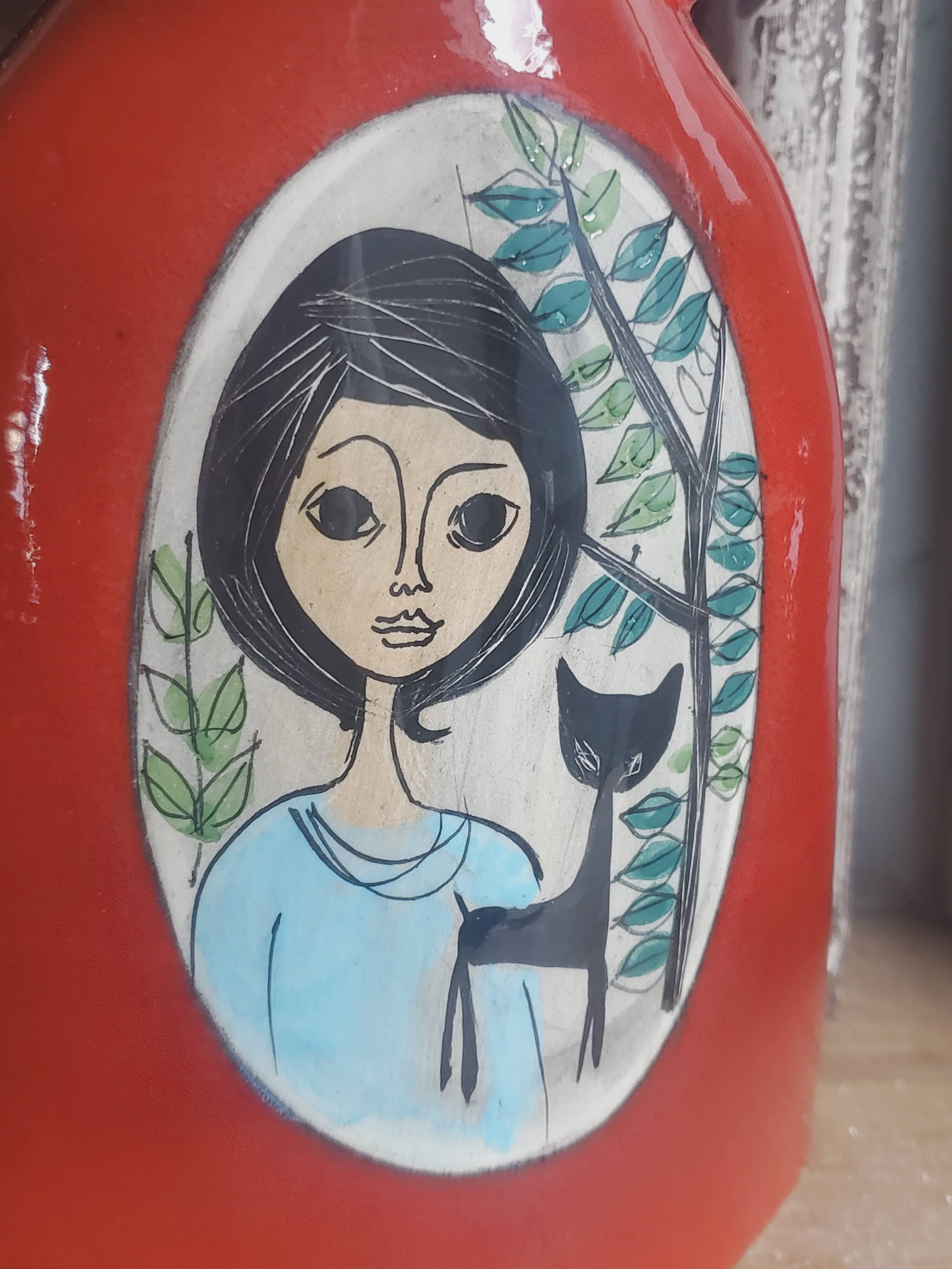 Vintage Français années 1960 Jean de Lespinasse, JdL 330, Vase ovale émaillé rouge avec portrait féminin.