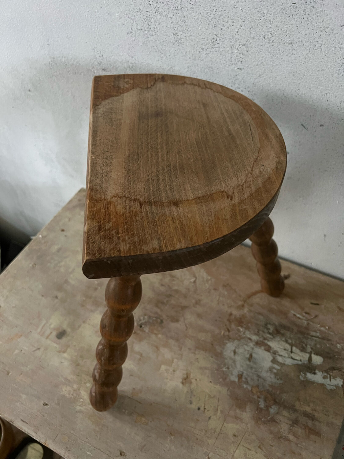 Wooden tripod stool