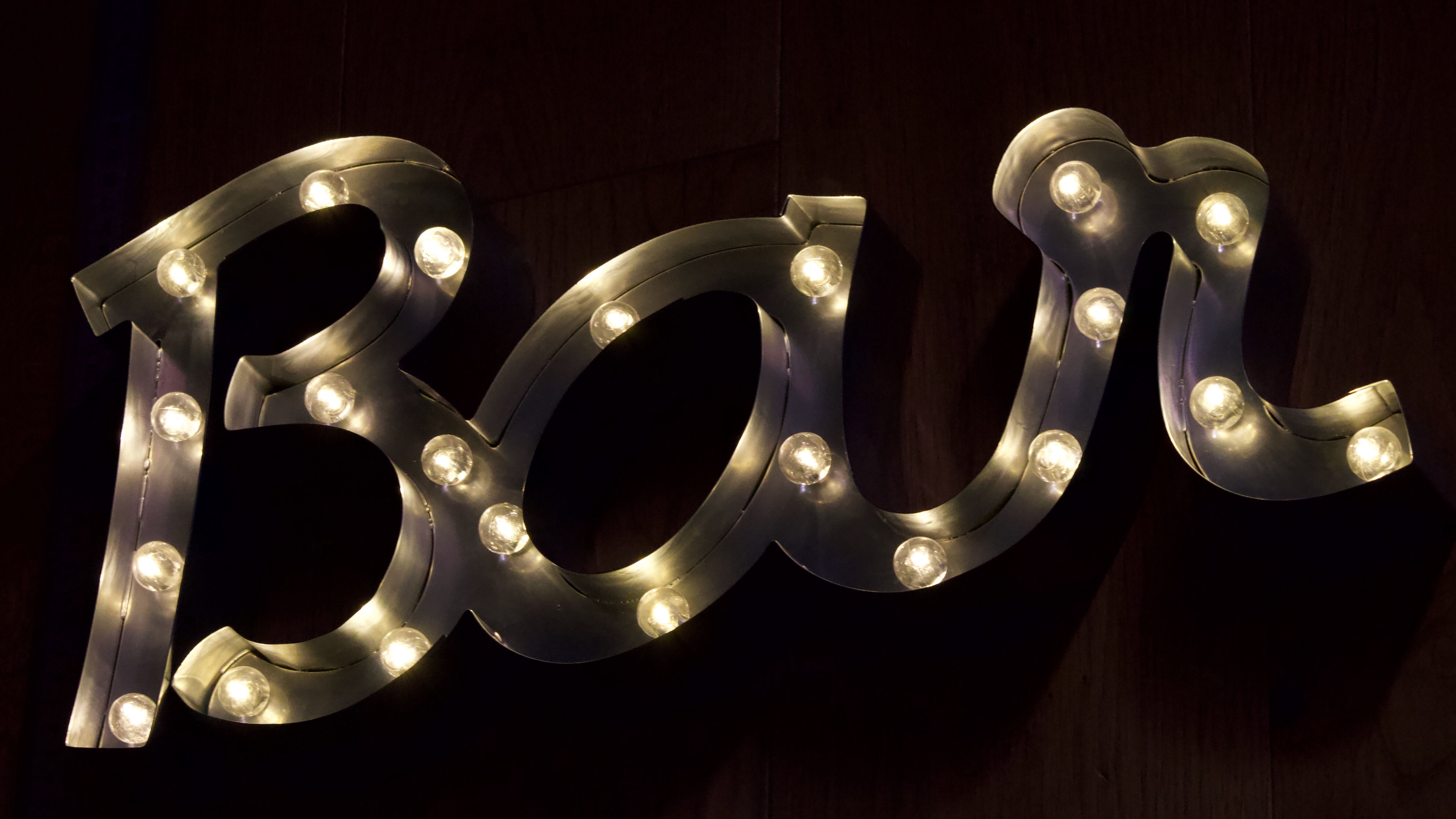 Ancient Light Sign in aluminium lettering forming the word "BAR"