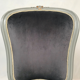 Chauffeuse de style Louis XV bois laqué gris rechampi or