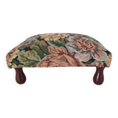 Footstool in floral upholstery
