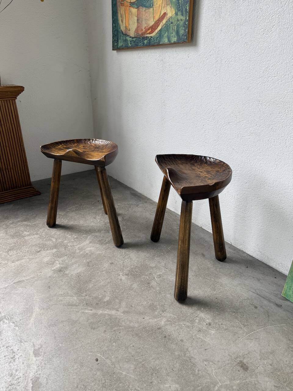 Pair of Le Selou tripod shepherd's stools