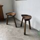 Pair of Le Selou tripod shepherd's stools
