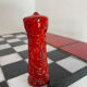 Chess set with ceramic board and pieces.