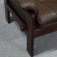 Pair of armchairs and ottoman in leather, 1970