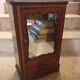 Antique doll cabinet