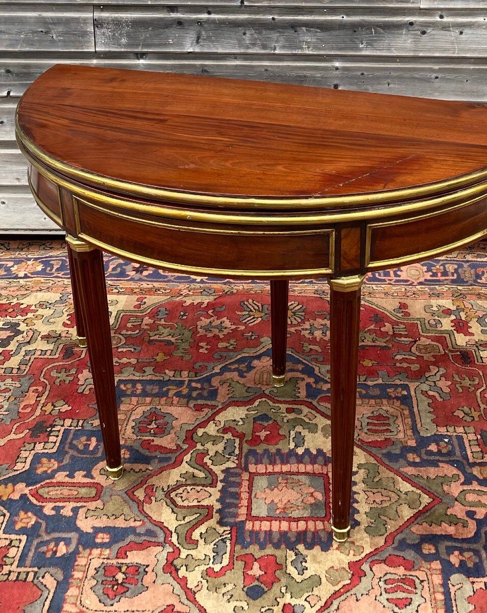 Half moon table in mahogany era Louis XVI XVIII th century