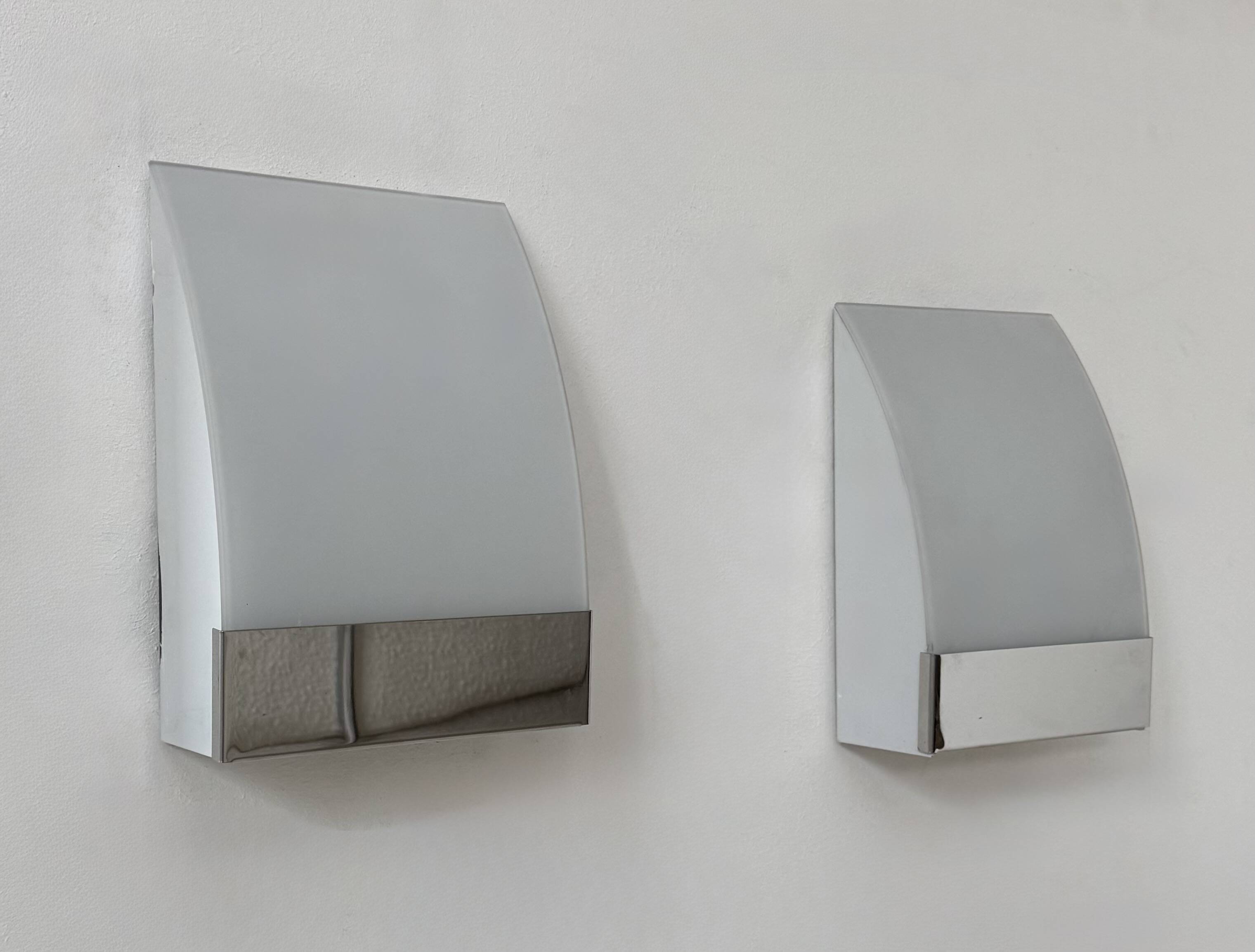 Pair of vintage wall lights, chrome-plated metal and frosted glass, France, 1980