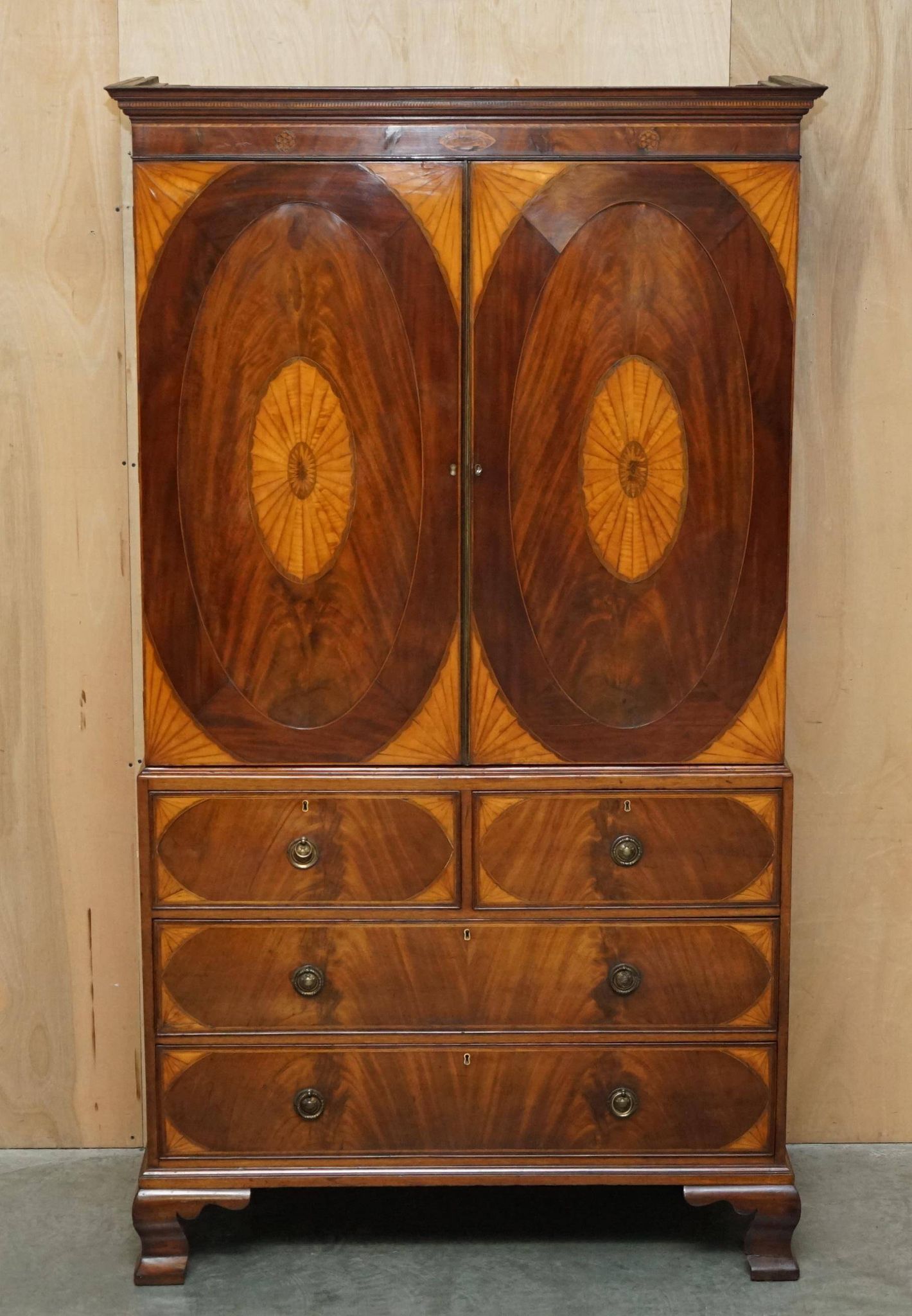 George III Sheraton linen cupboard in walnut, circa 1760.