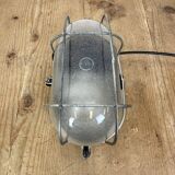 Industrial brown bakelite wall light with frosted glass, 1960s