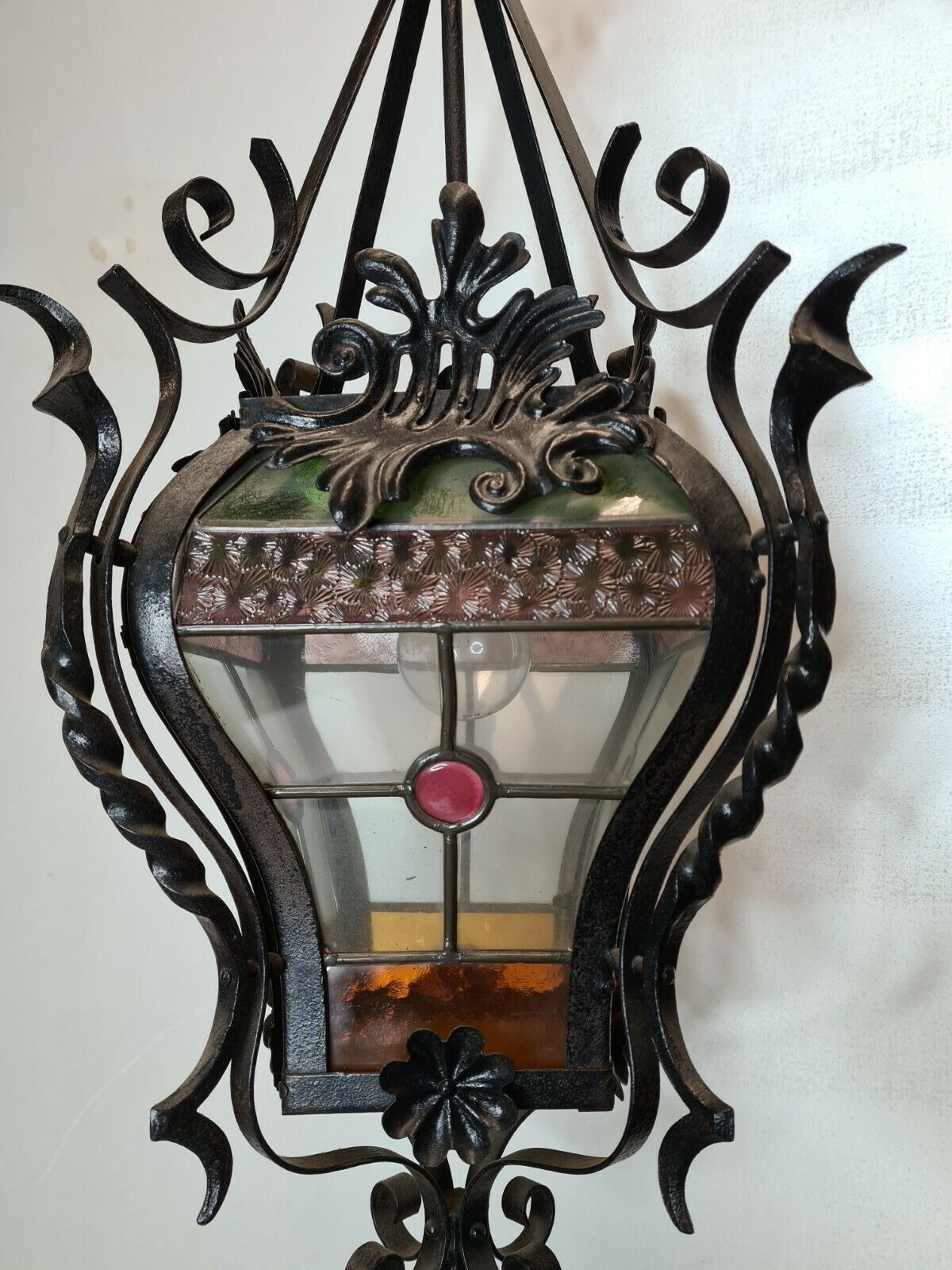 Wrought iron lantern with stained glass