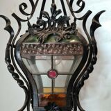 Wrought iron lantern with stained glass