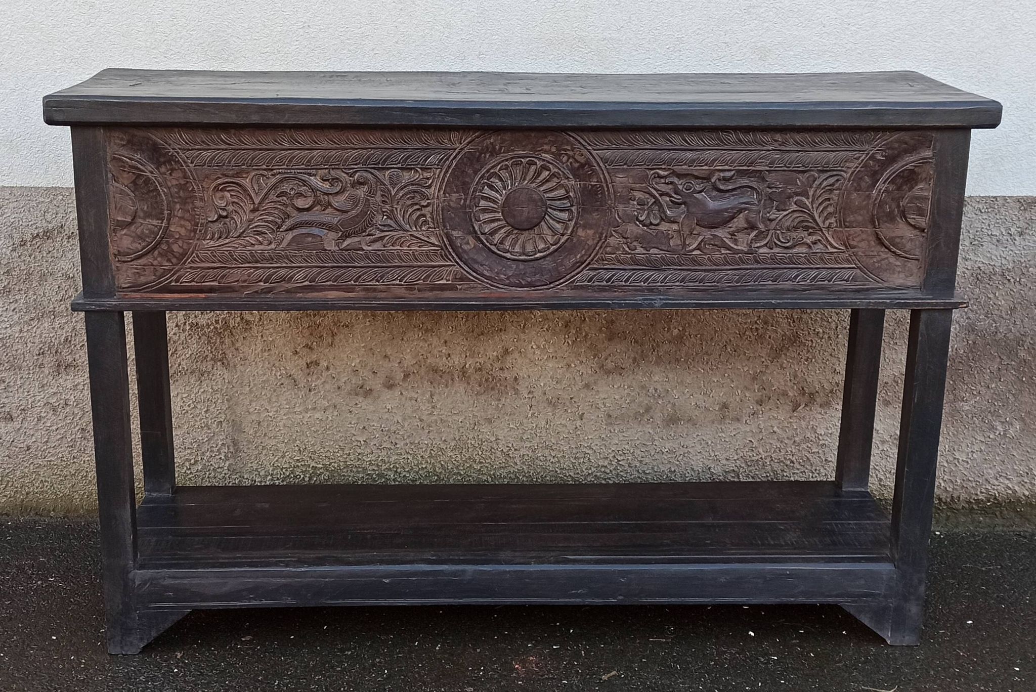 Console in old black wood with integrated chest
