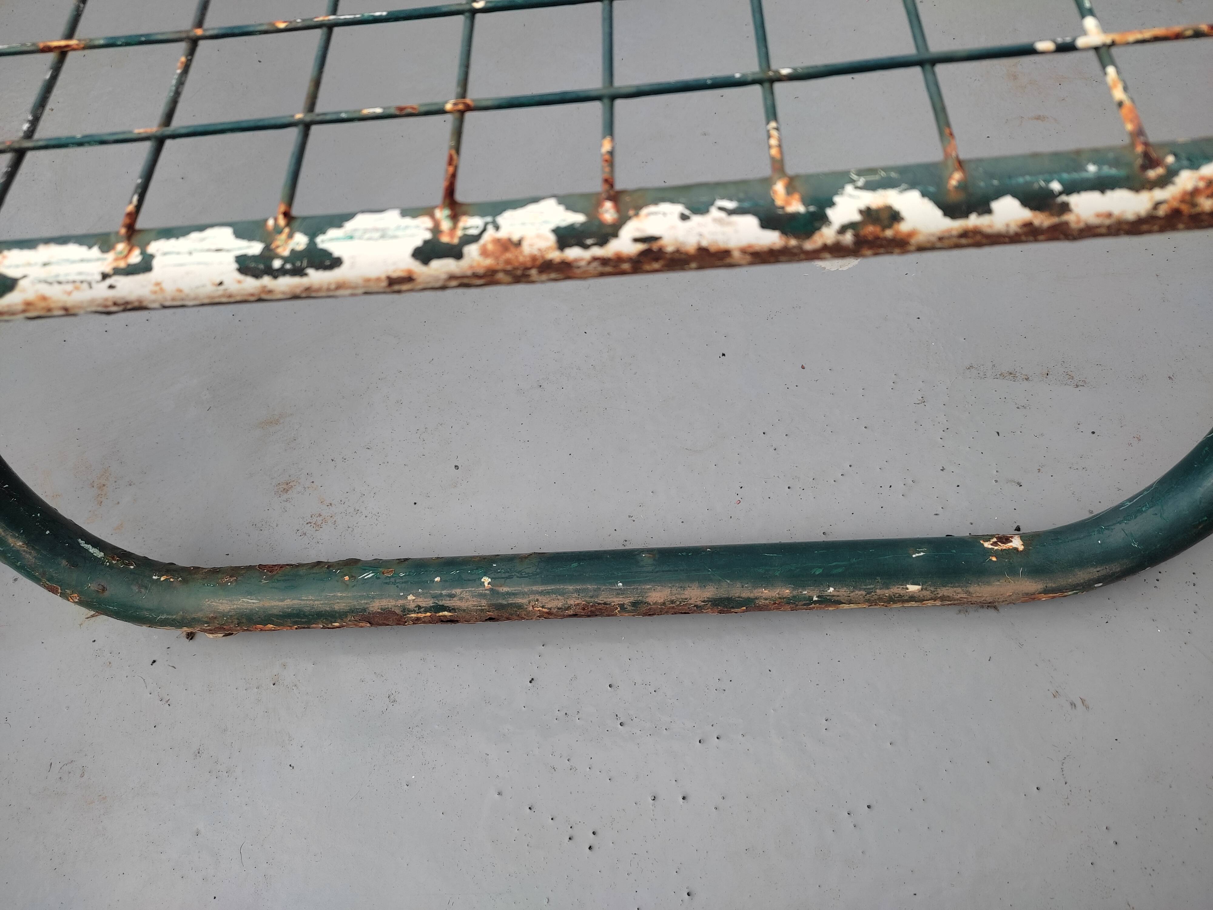 Pair of metal deckchairs