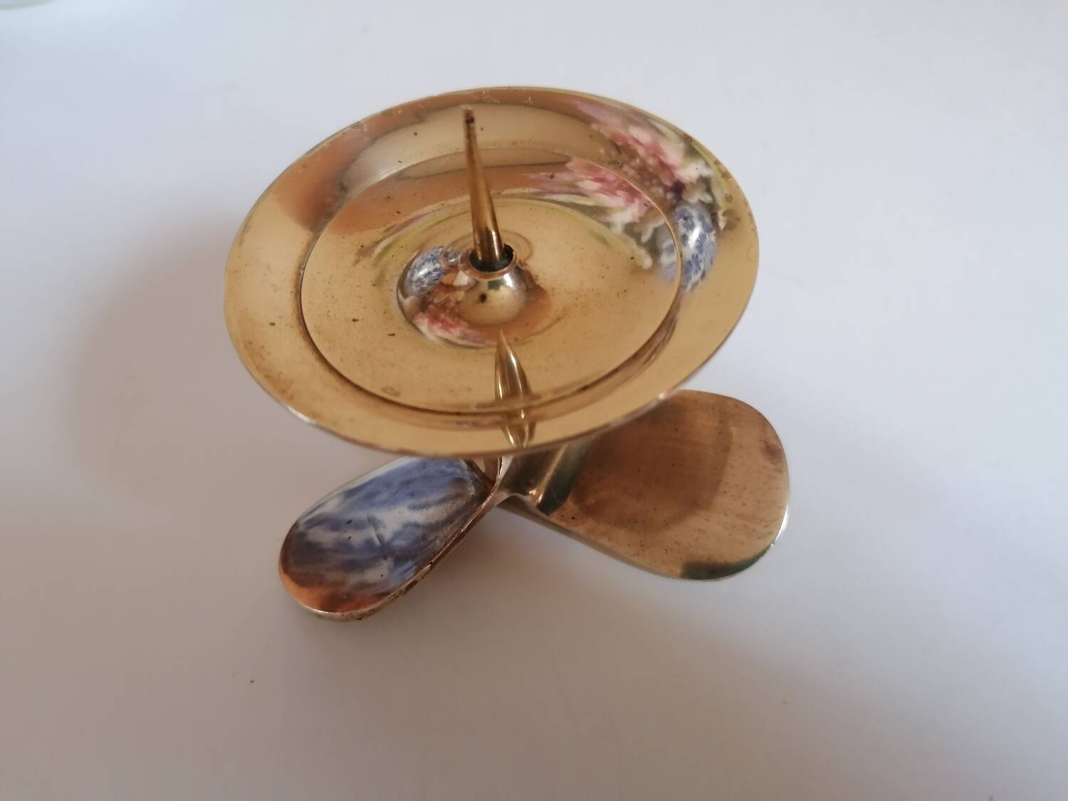 Two brass aviation propeller candle holders