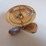 Two brass aviation propeller candle holders