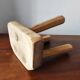 Vintage Danish brutalist tripod stool made of solid oak.