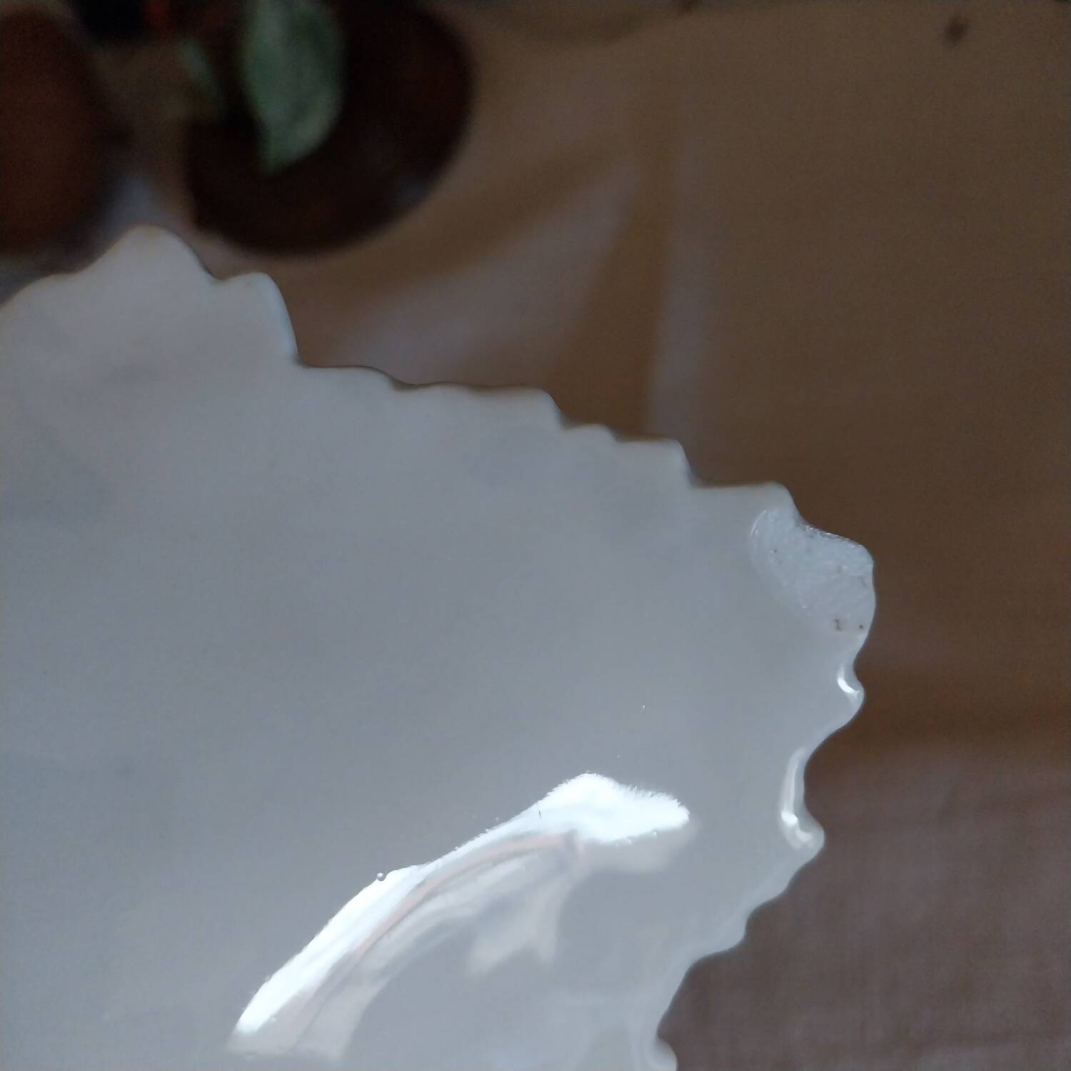 Old footed dish in slipware