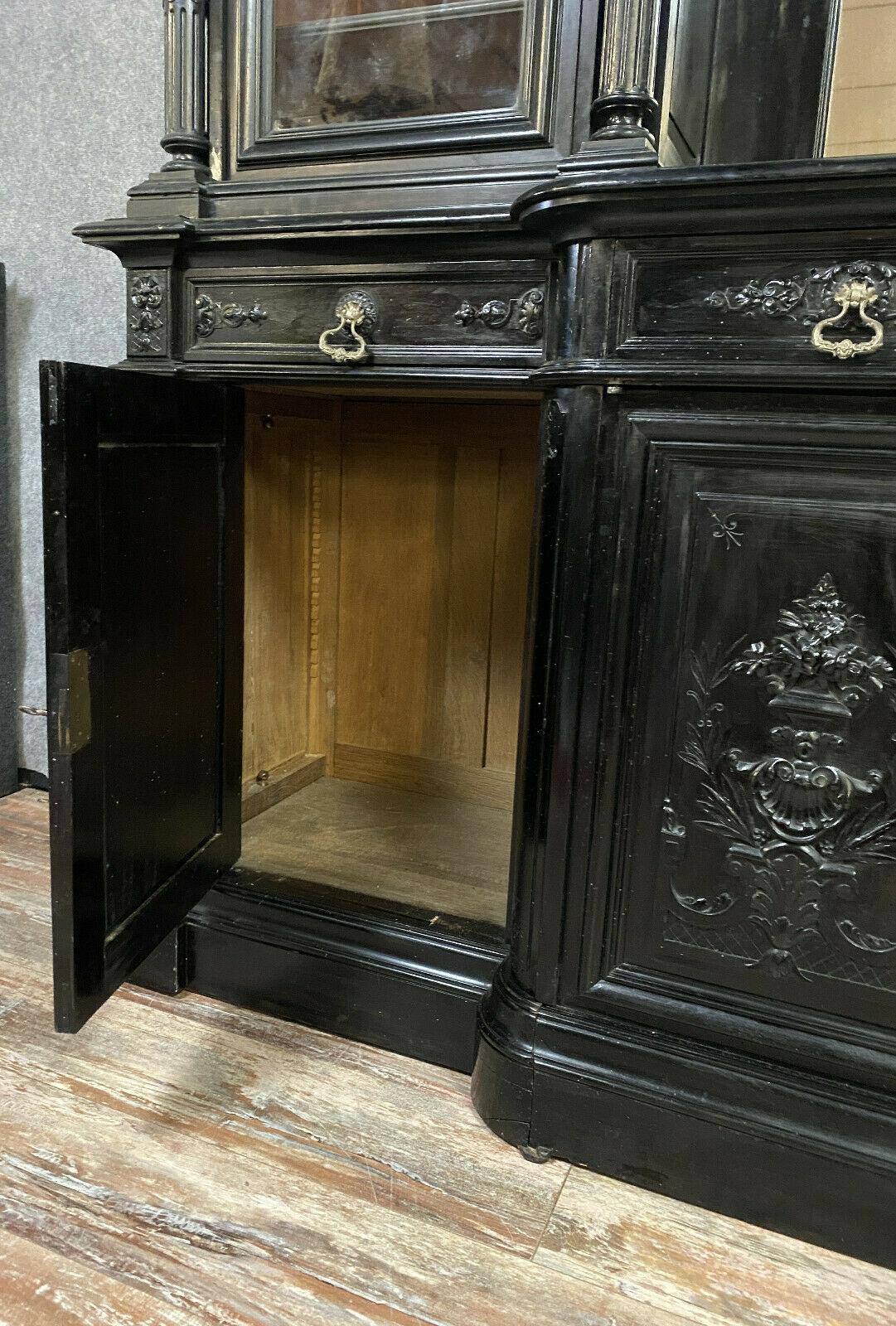 Renaissance Castle library in blackened wood with secret passage around 1850
