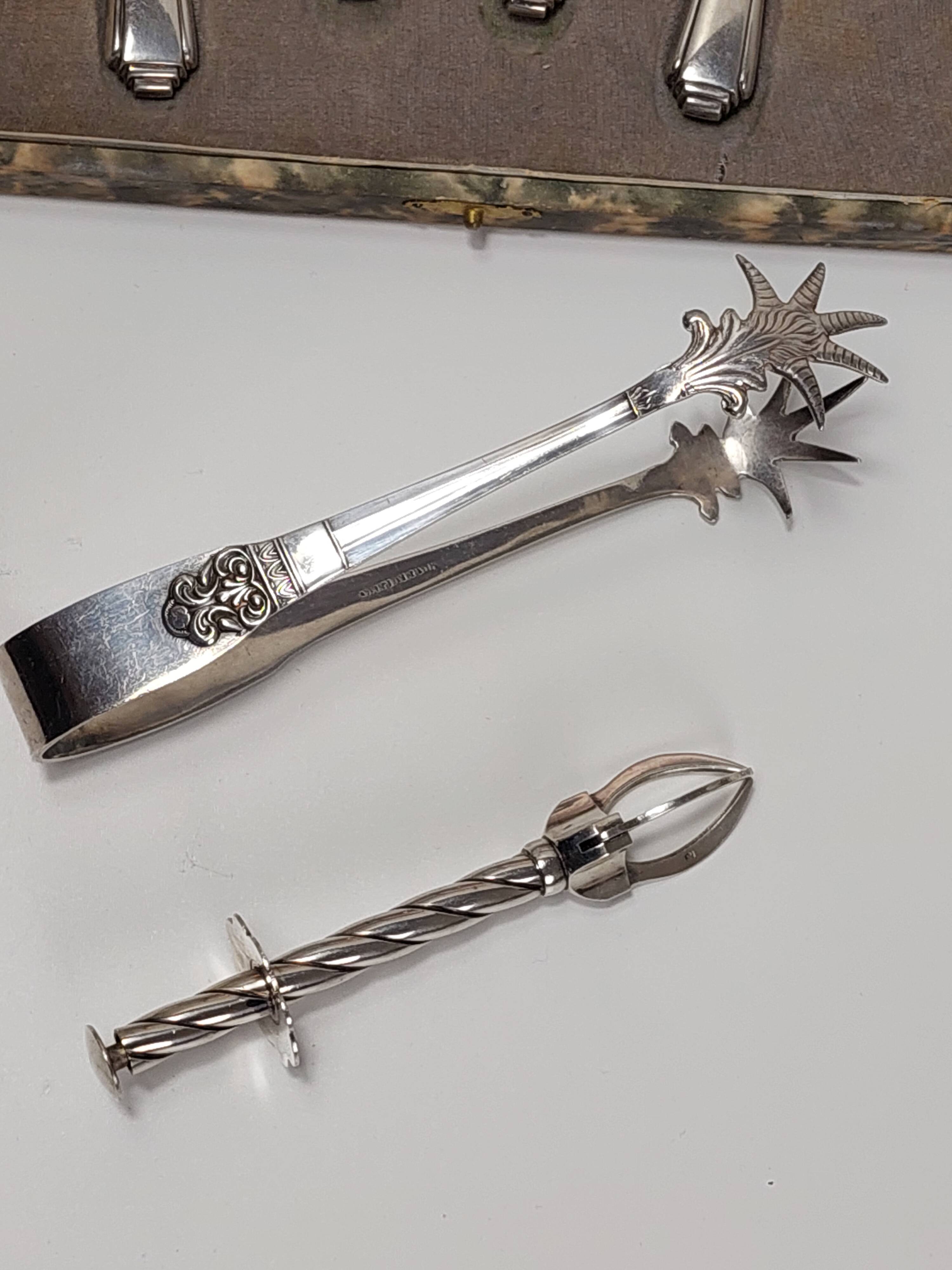 Set of dessert cutlery + 2 sugar tongs