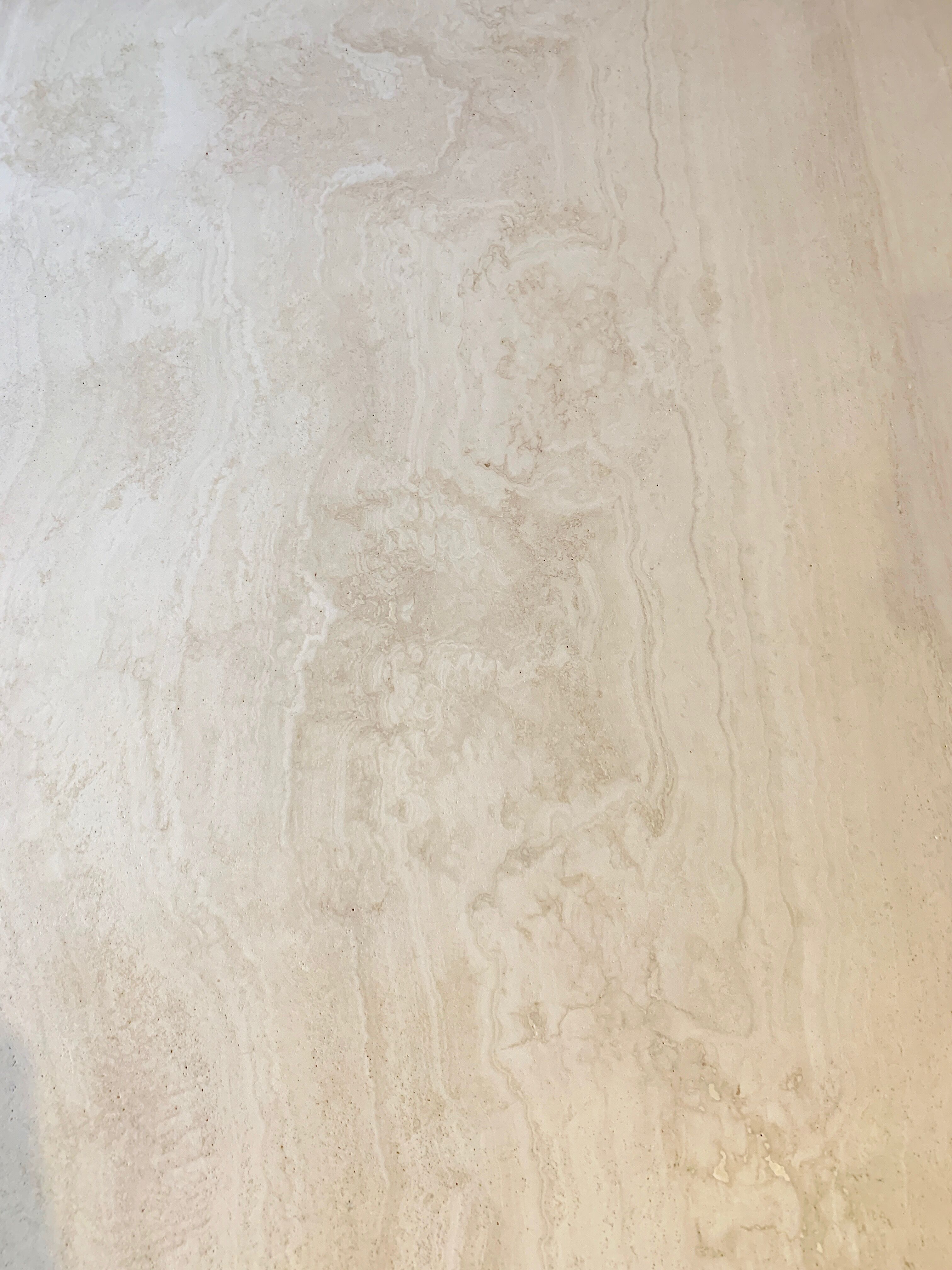 Round travertine dining table