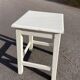 White square wooden stool