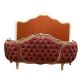 Upholstered bed in rosewood fabric