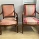 Pair of Restoration style armchairs with curved arms and cabriole legs