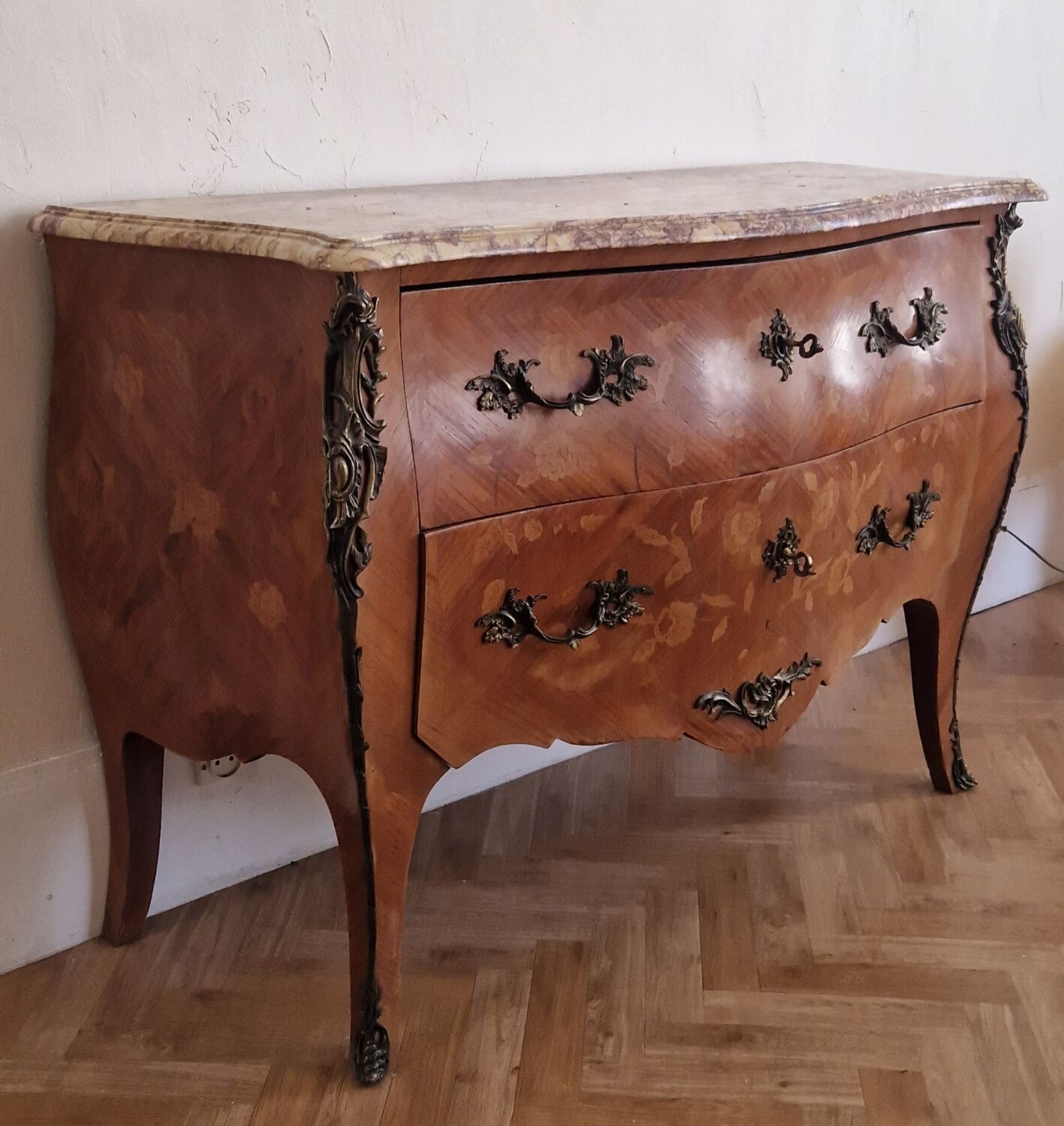 Louis XV style commode, pink and ochre marble.