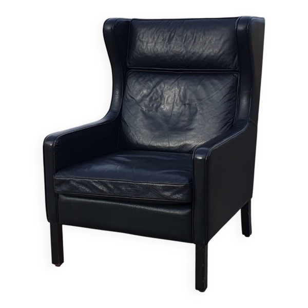 Fauteuil à oreilles scandinave vintage en cuir noir Lulu Stouby — Beyit