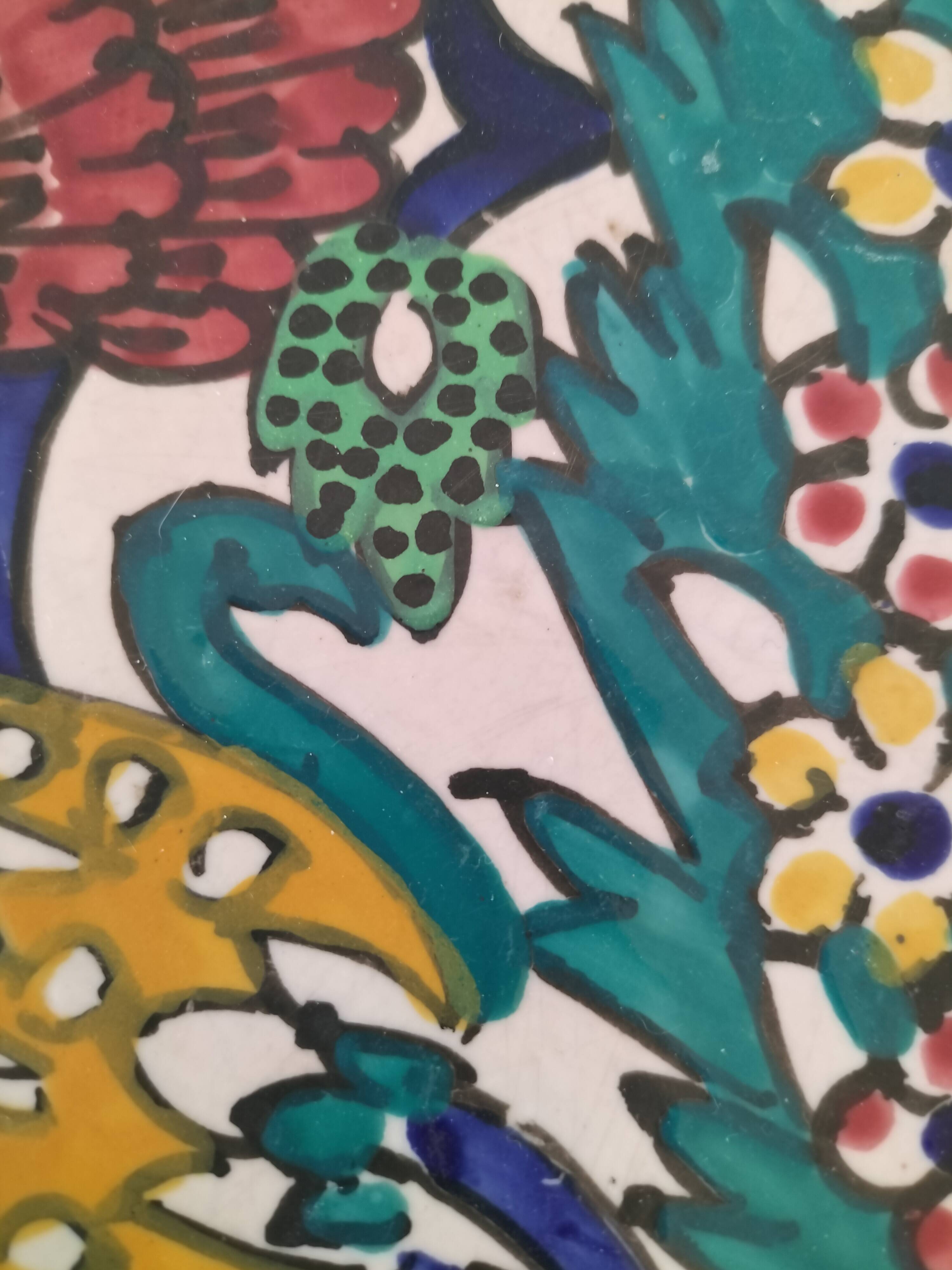 Decorated ceramic plate