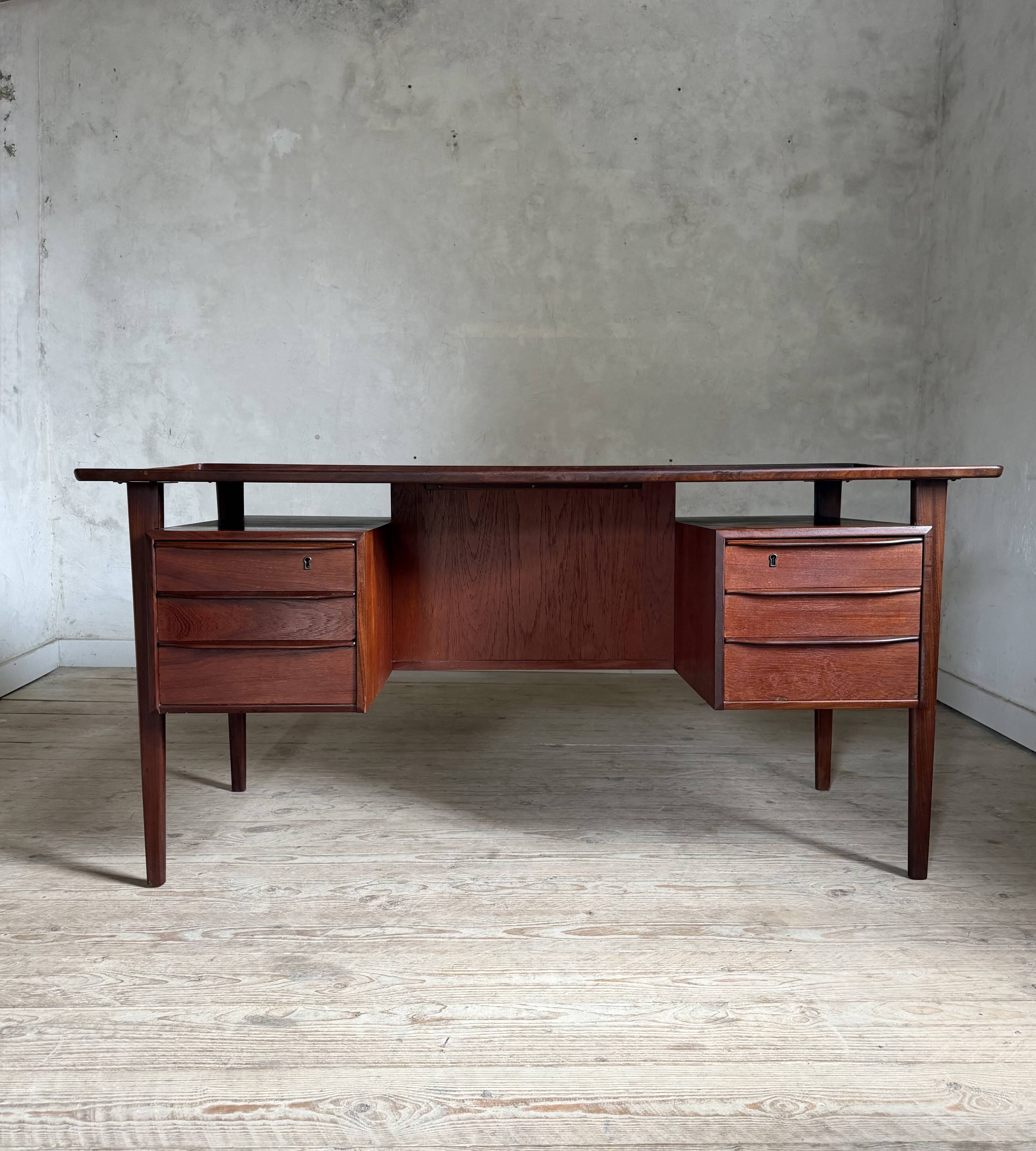 Danish vintage desk in teak by Peter Lovig Nielsen