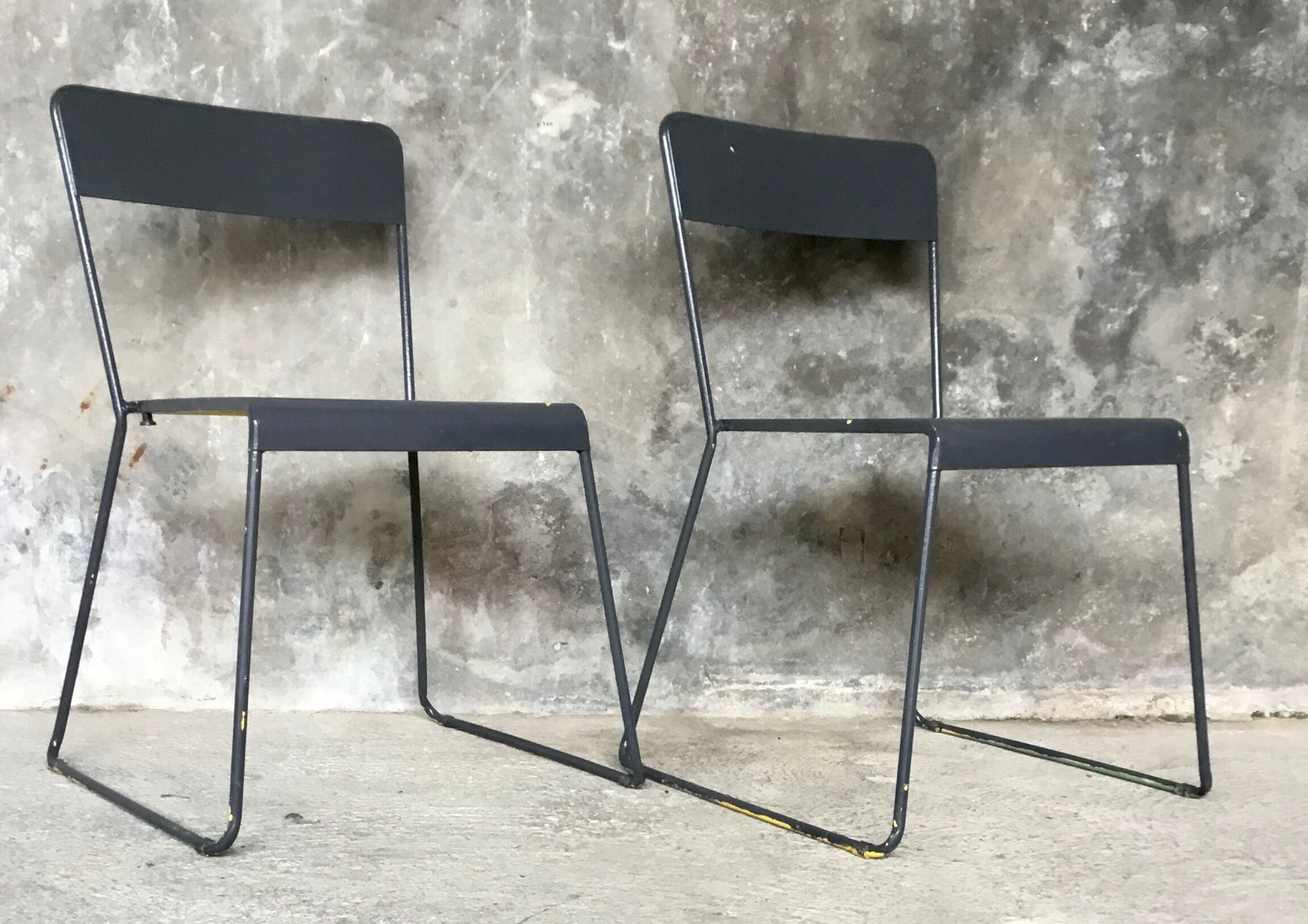 Pair of stackable metal chairs with sled feet - 1960