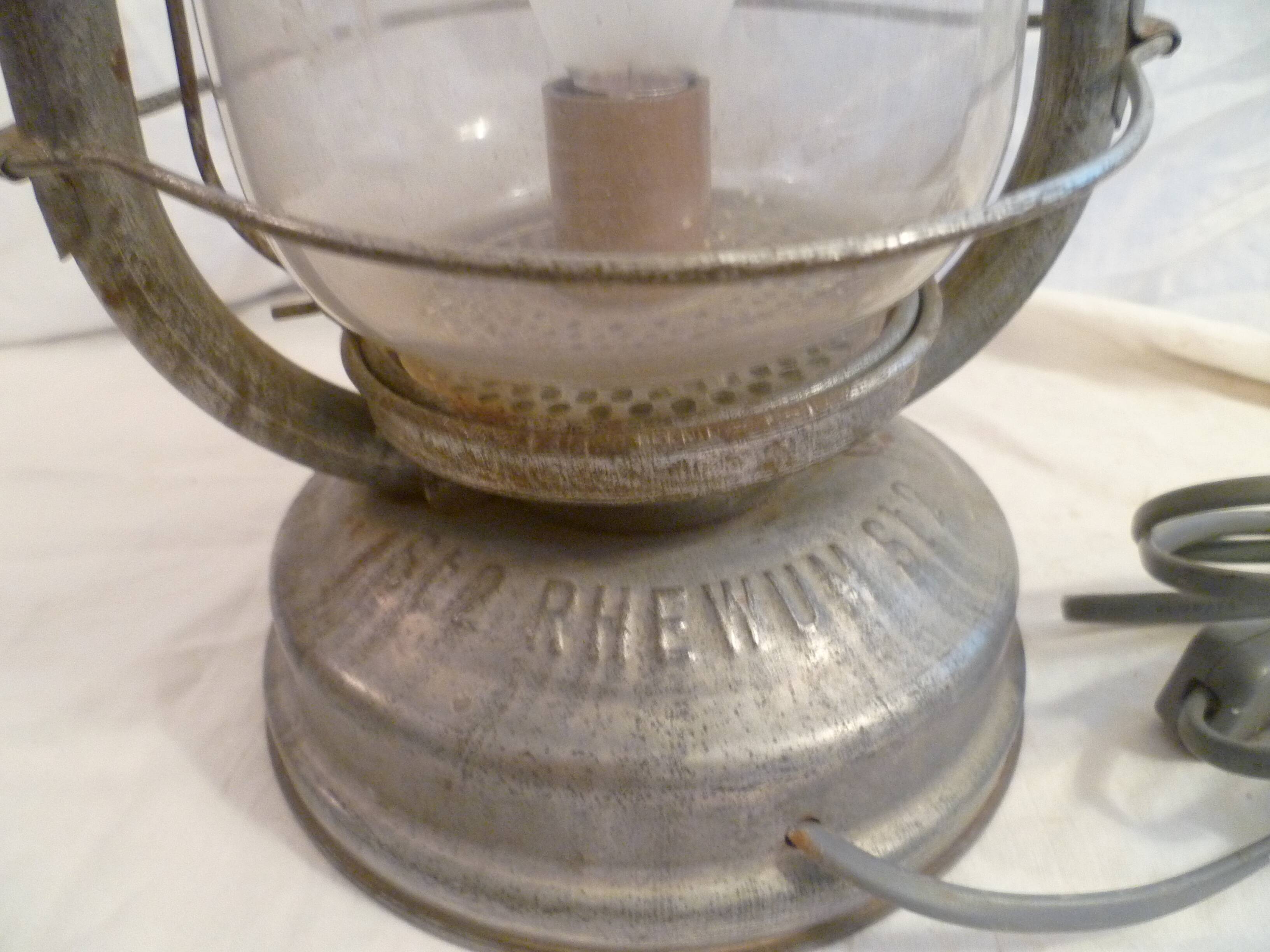 Vintage glass/metal storm lamp from the brand: rhewum germany