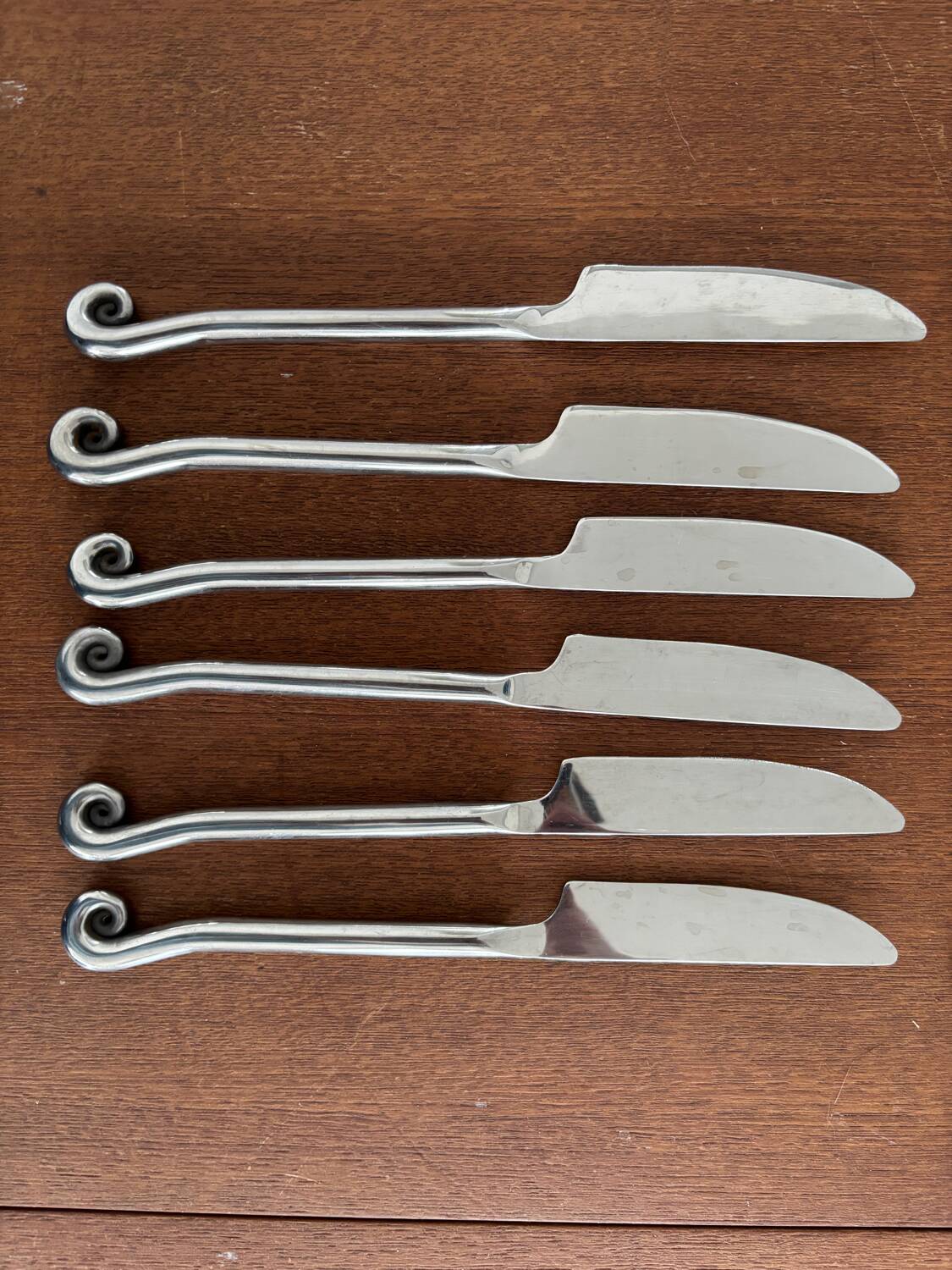 Vintage 24-piece stainless steel cutlery set with spiral handles