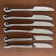 Vintage 24-piece stainless steel cutlery set with spiral handles