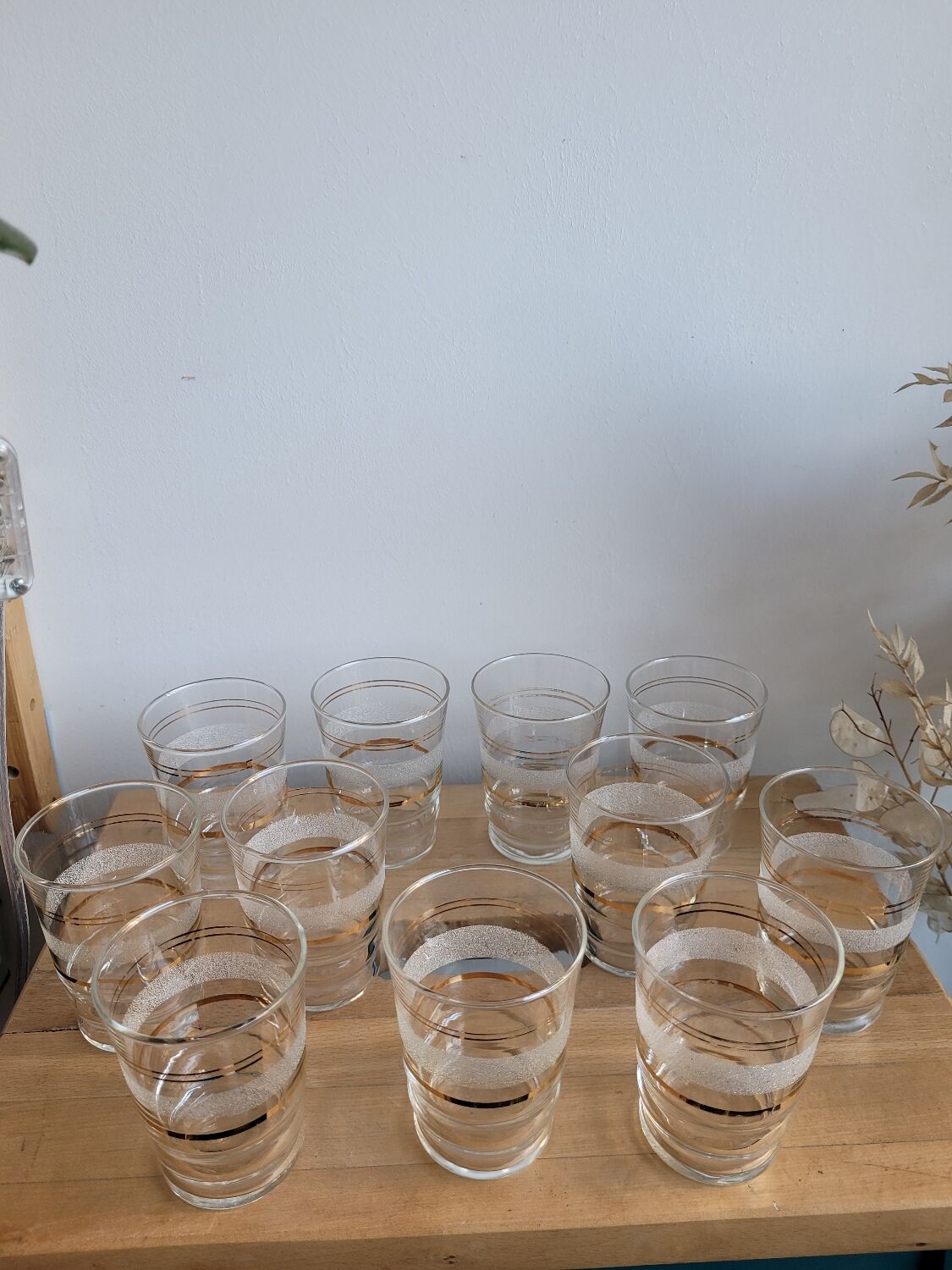 Set of 11 granite glass cups and golden edging