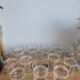 Set of 11 granite glass cups and golden edging