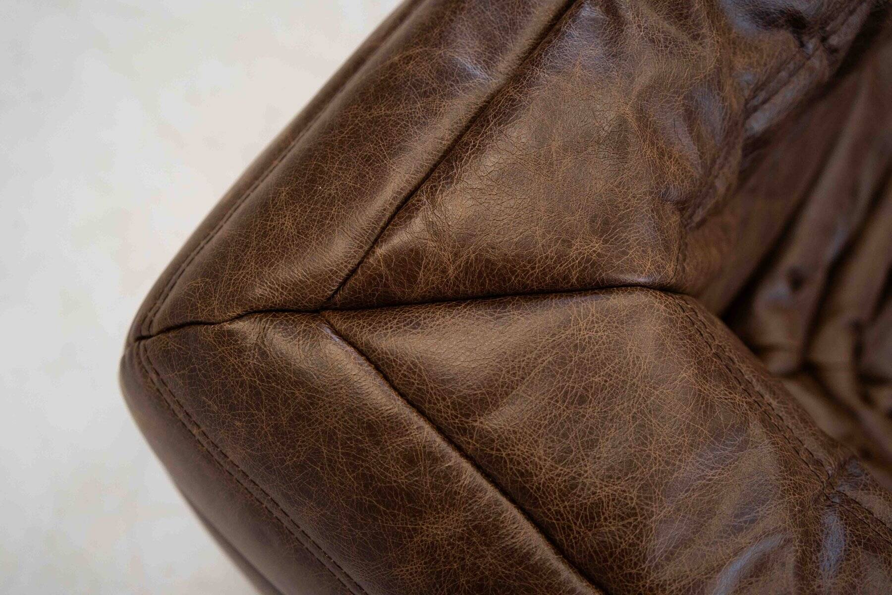 Vintage two-seater Togo sofa with arms in brown leather by Michel Ducaroy for Ligne Roset, 1970s