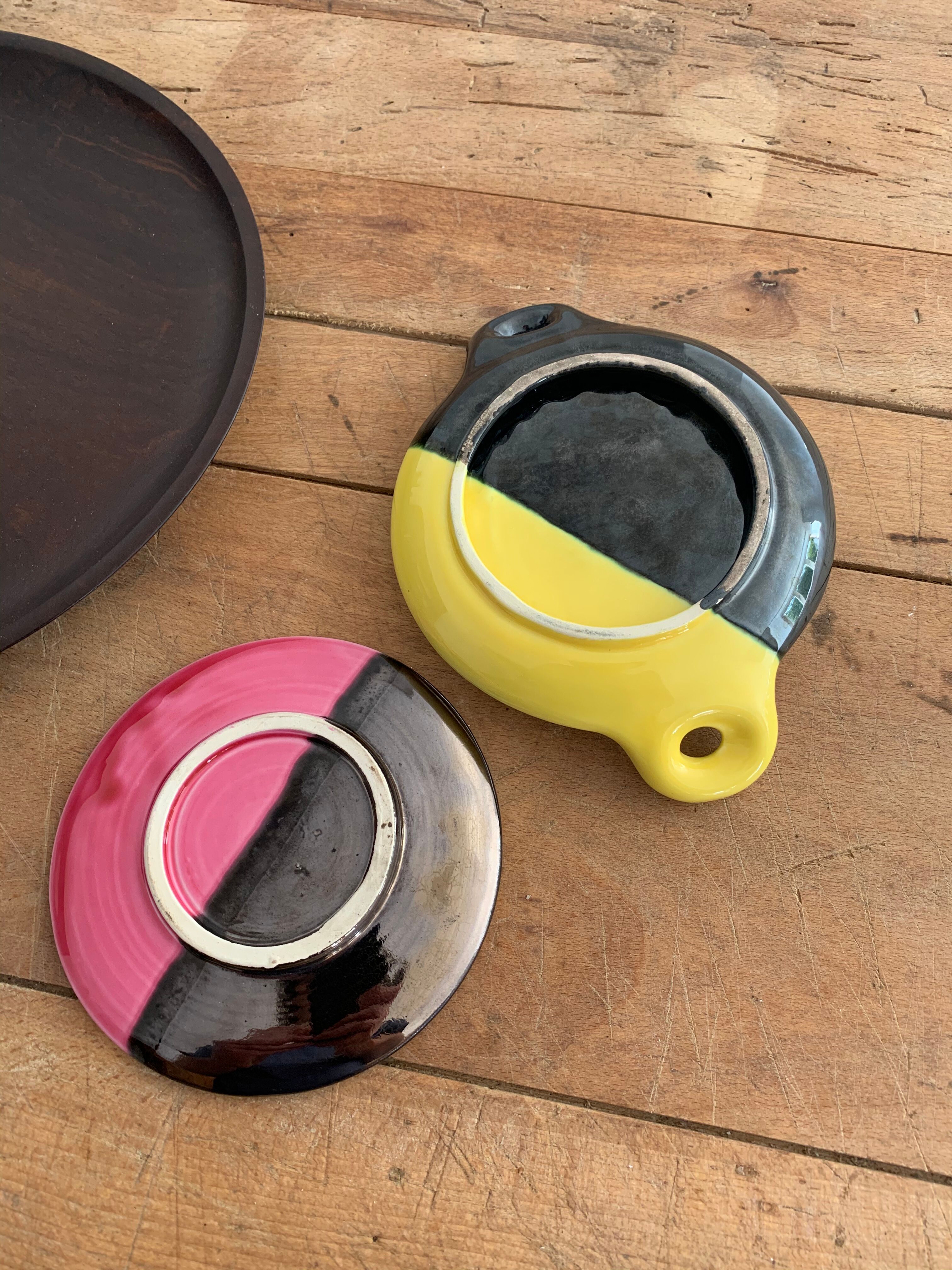 Duo of vintage earthenware cups