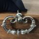 Old silver-plated metal furniture handle