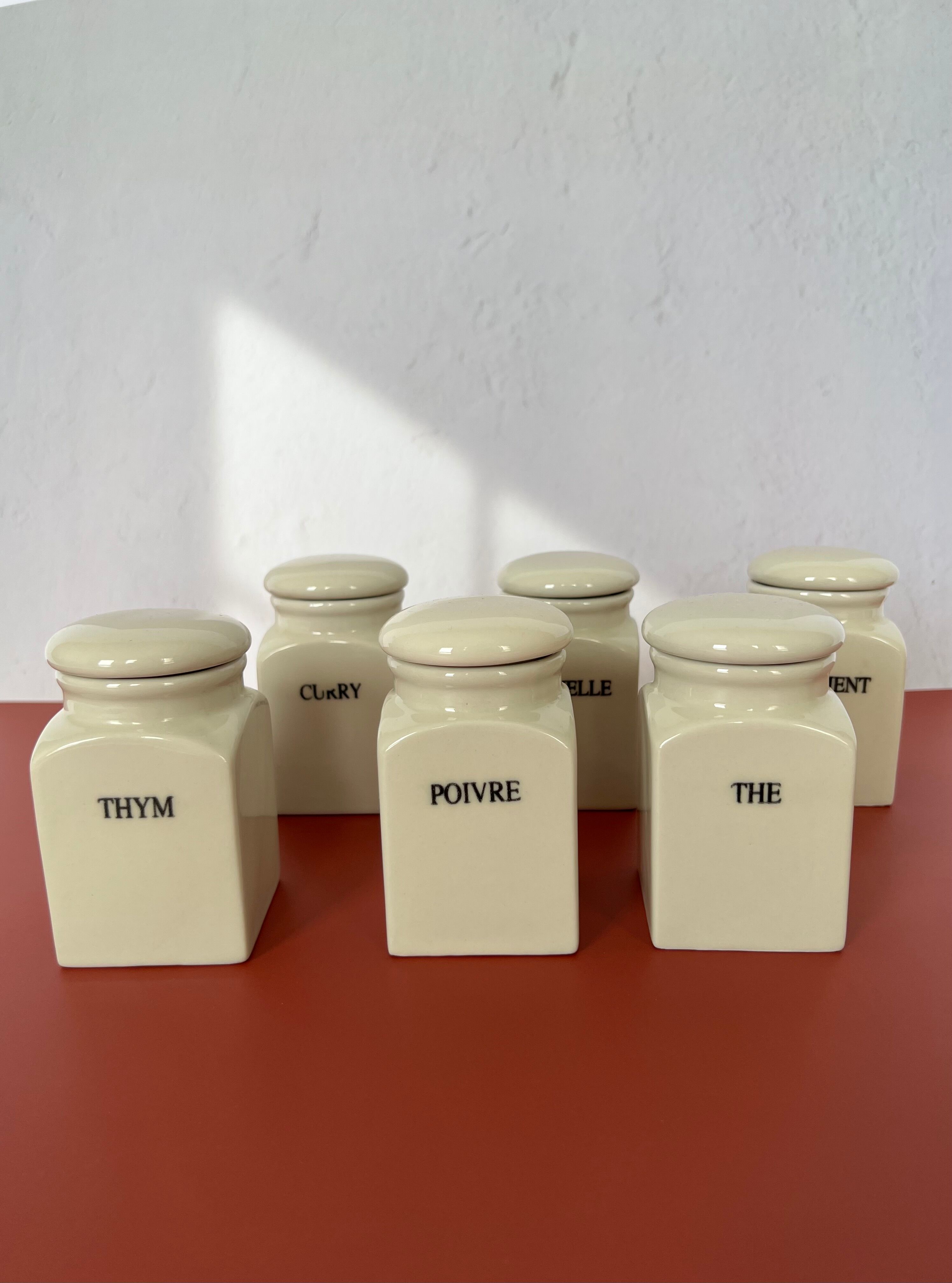 Set of vintage porcelain spice jars