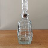 Glass carafe in the shape of a perfume bottle