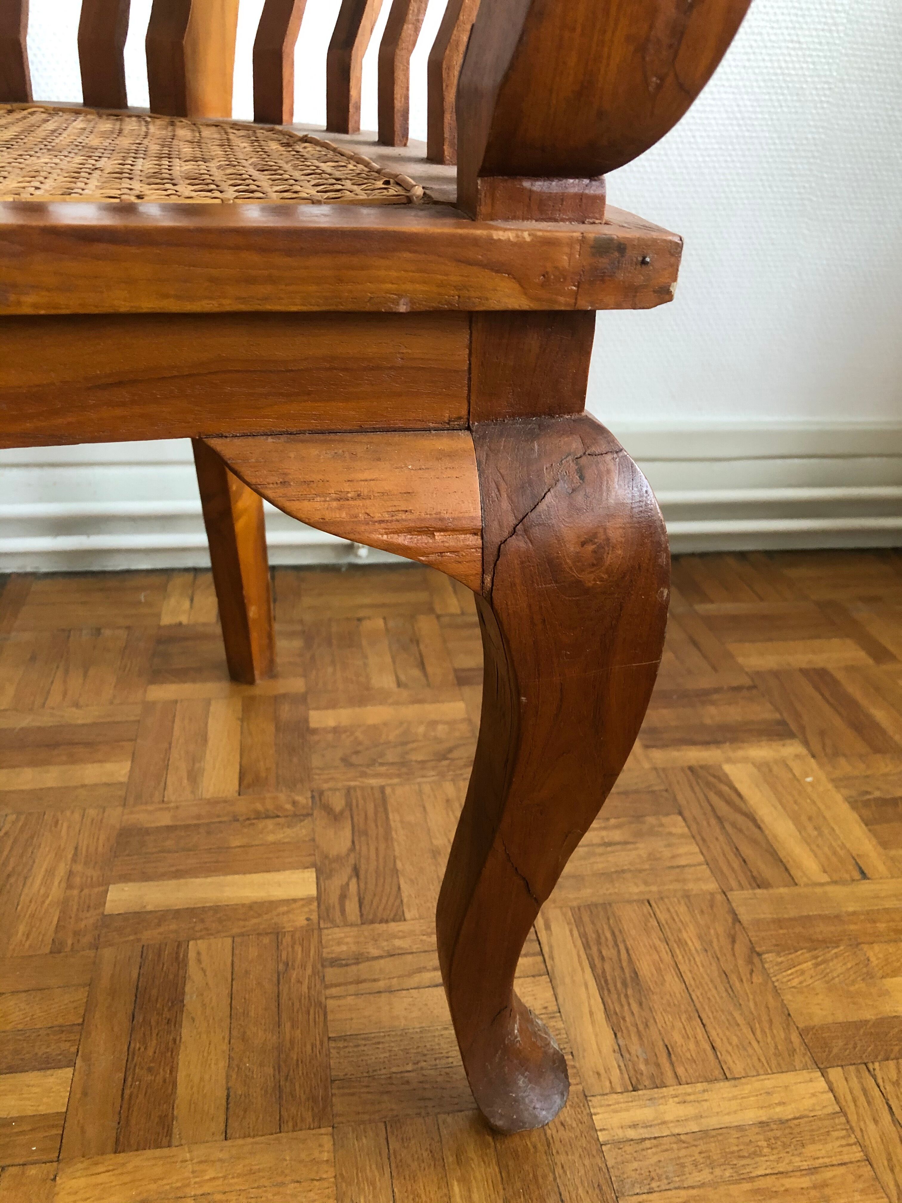 Exotic wooden canne colonial armchair