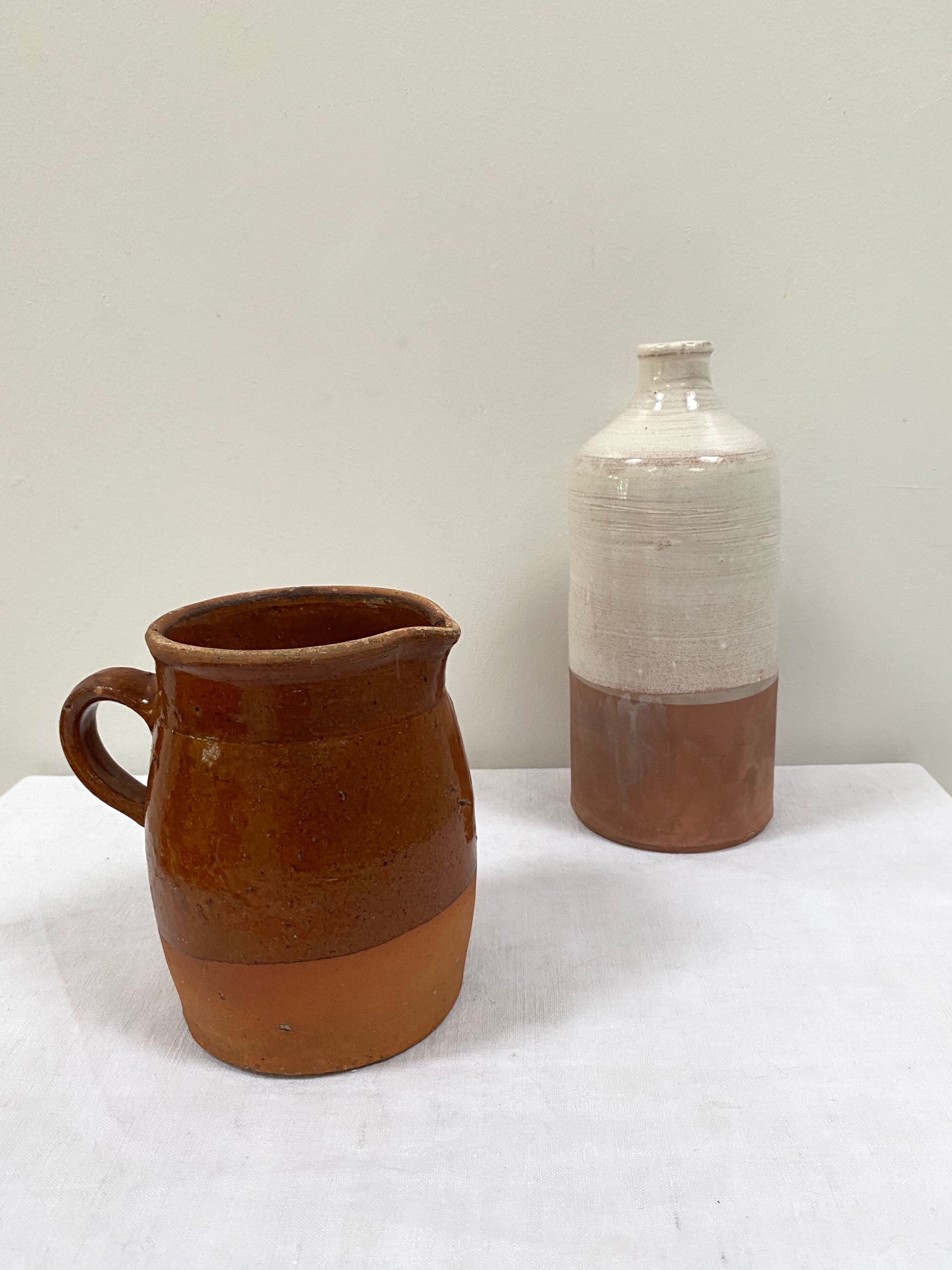 Pitcher old vase in two-tone sandstone
