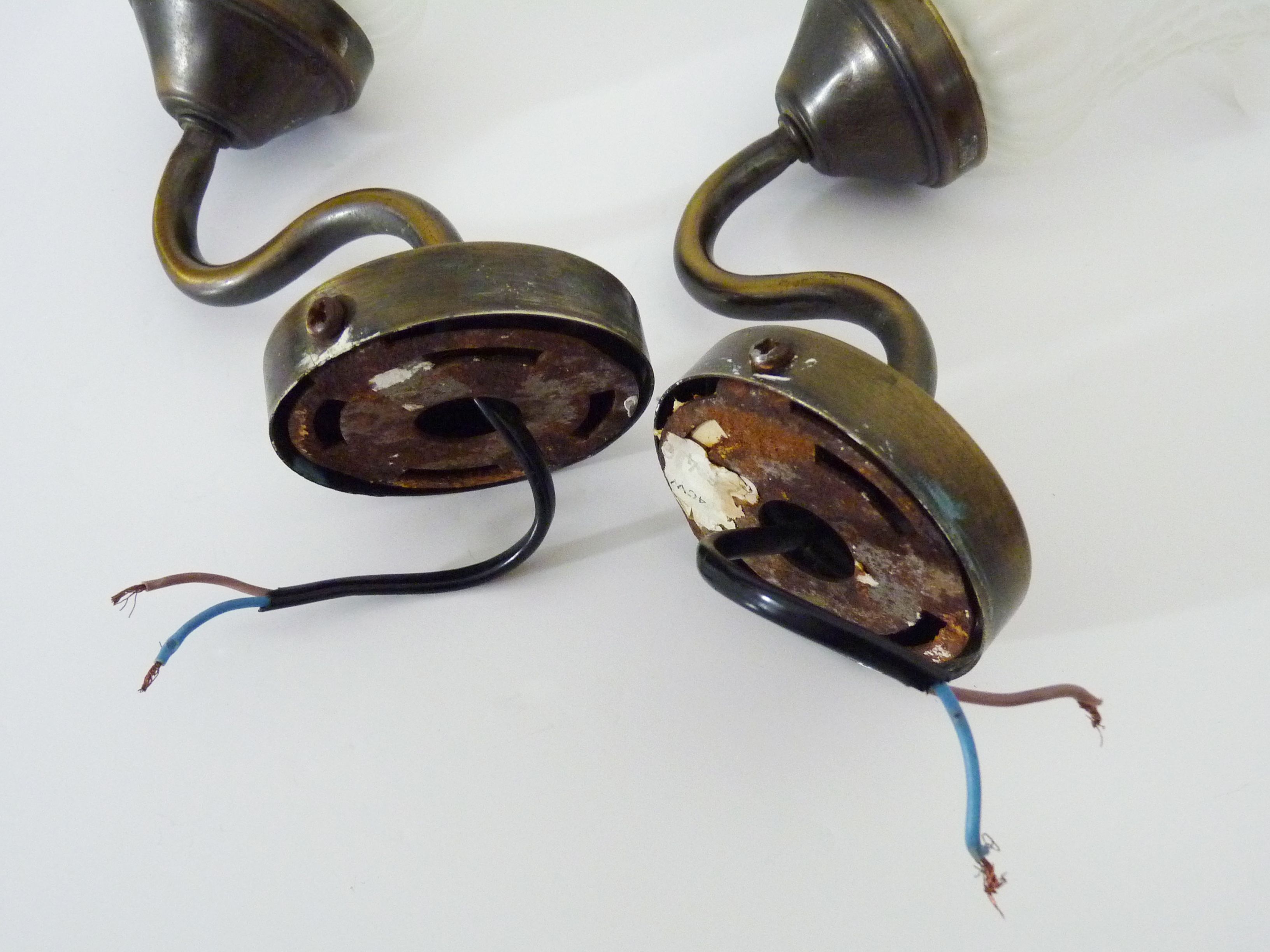 Pair of vintage brass gooseneck wall sconces and glass tulip. Year 60